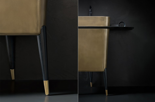 meuble de salle de bain design avec piètement et finitions laque doré