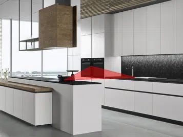 Triangle d'or ou d'activité en cuisine illustré par une zone rouge sur un modèle de cuisine Snaidero