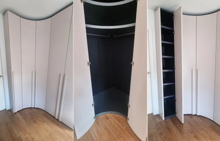 Intérieur d'un dressing haut de gamme à Maisons-Alfort avec un angle arrondi